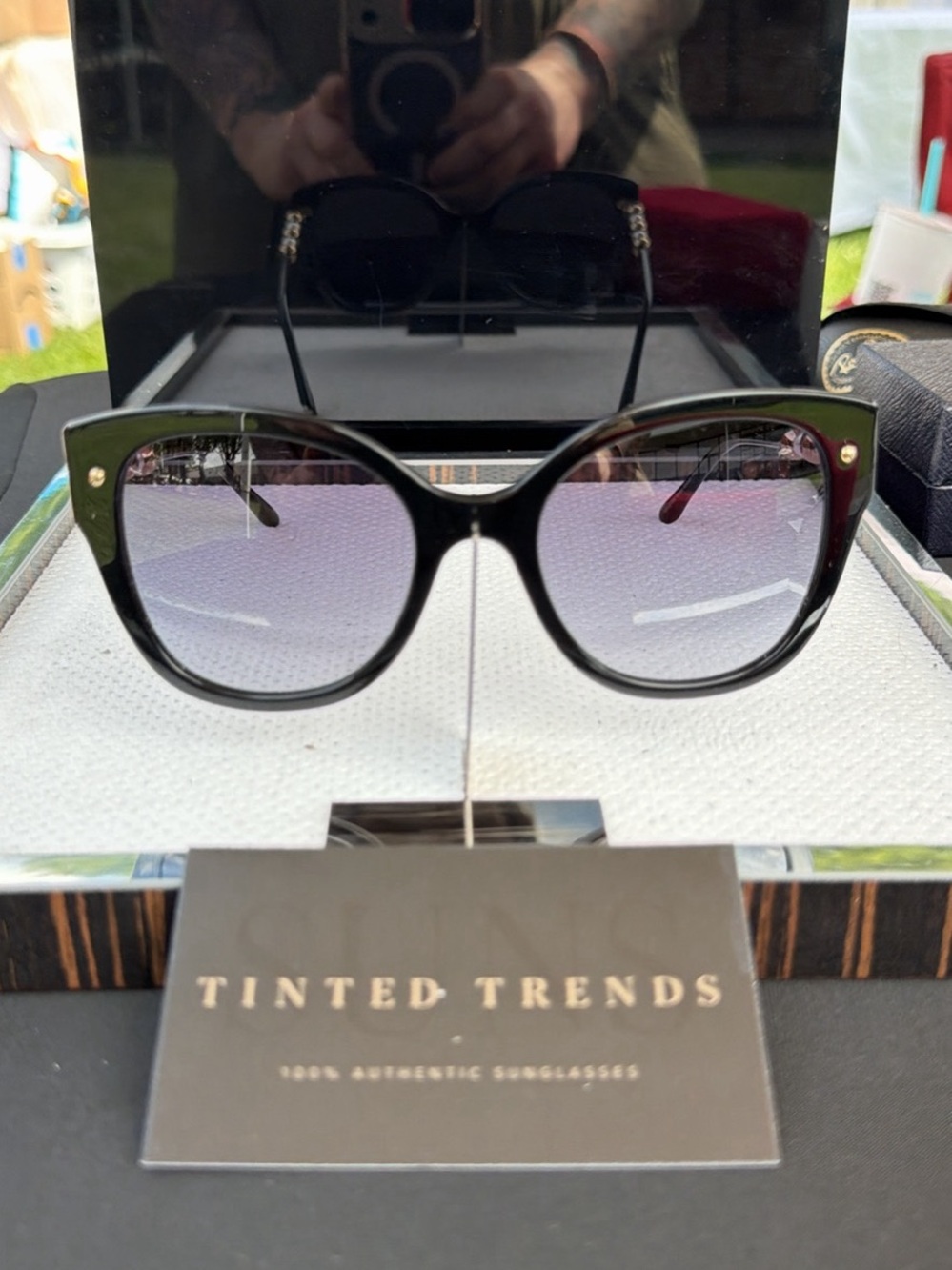 Carolina Herrera Black Cateye Sunglasses with Purple Gradient Lenses